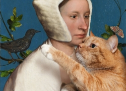 Hans Holbein the Younger , A Lady with a Squirrel, a Starling, and a Cat